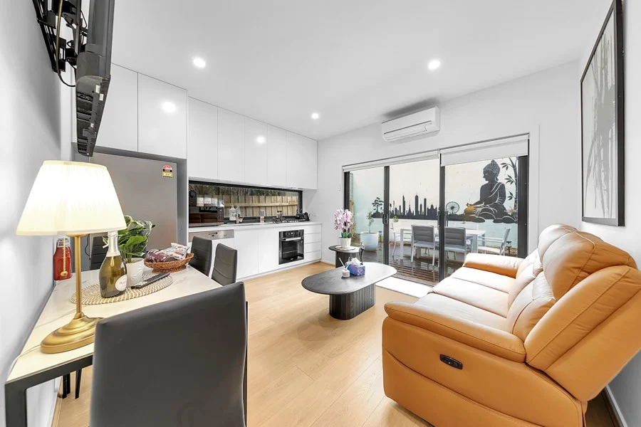 Living area, kitchen and outdoor space at the Cremorne five-bedroom home